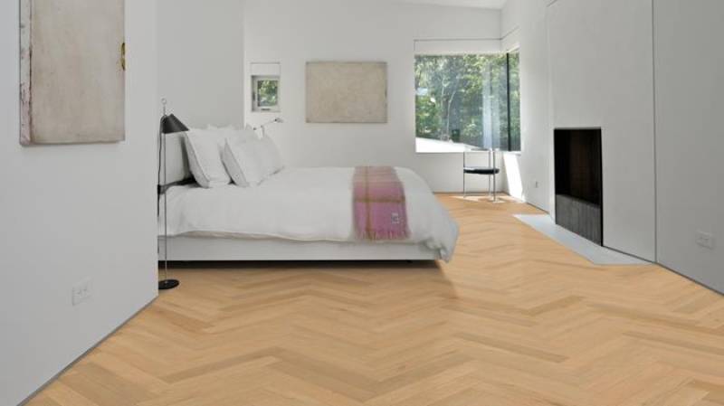 Commandez un parquet vinyle imitation bois clipsable en bâton rompus compatible chauffage au sol sur Genève en Suisse