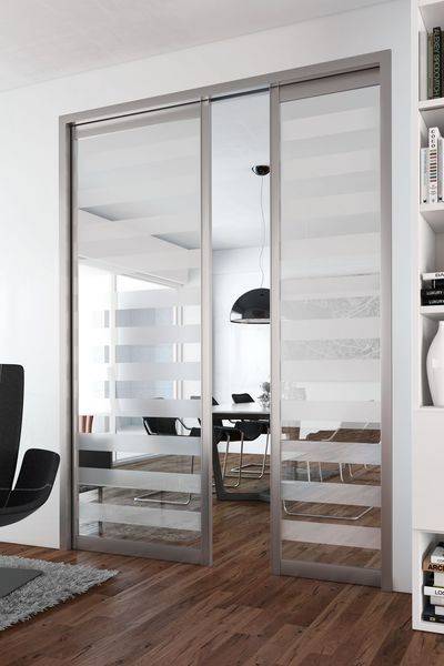 style atelier Porte à galandage style loft à Lyon en région Auvergne Rhône Alpes Decibois